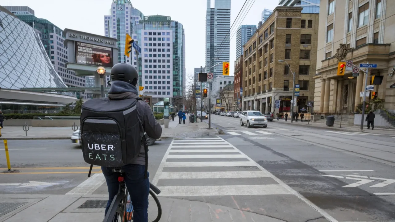 ubereats delivery man on a bicycle in toronto
