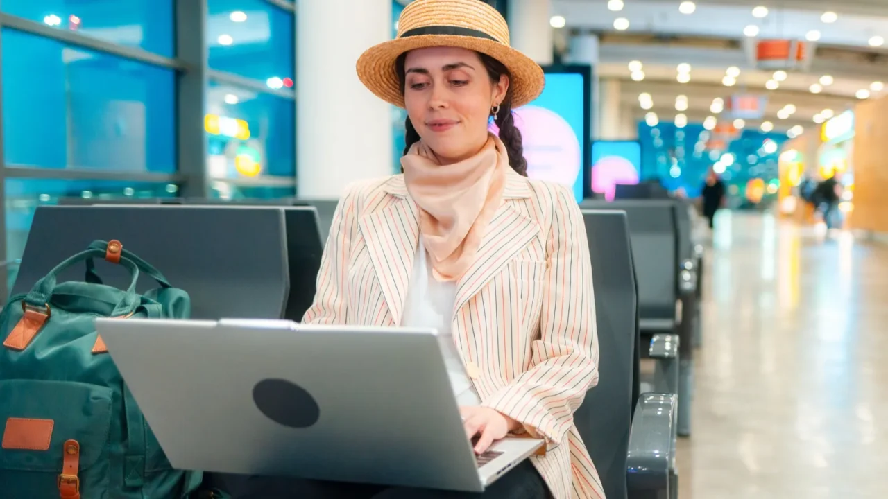 young caucasian elegant happy woman is sitting on a chair