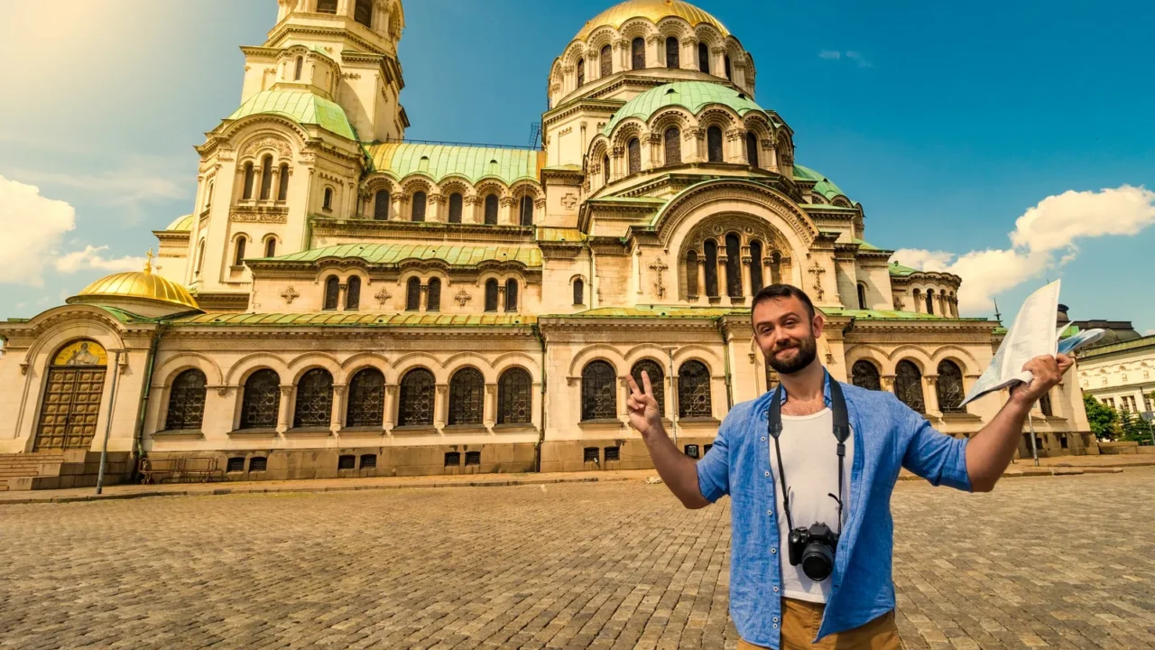 young caucasian man in alexander nevsky cathedral in sofia bulgaria
