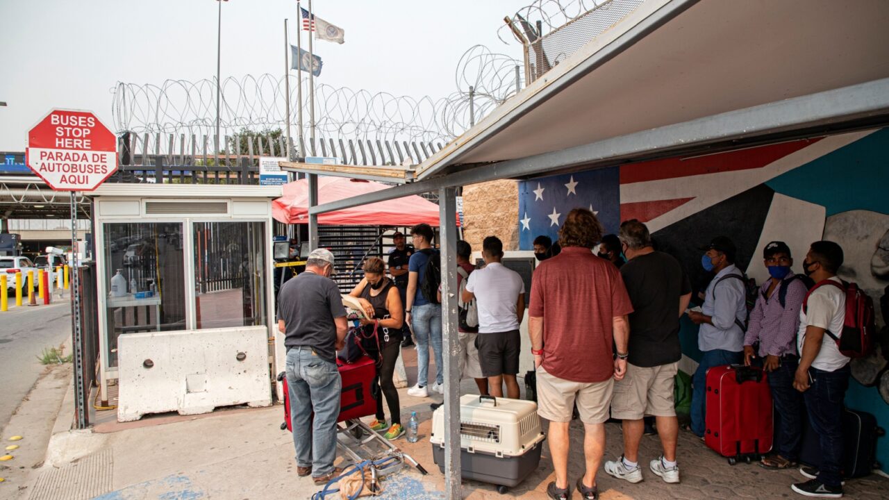 Tijuana and San Diego residents line up at the Otay gate to cross the Tijuana border line Thursday, September 10, 2020