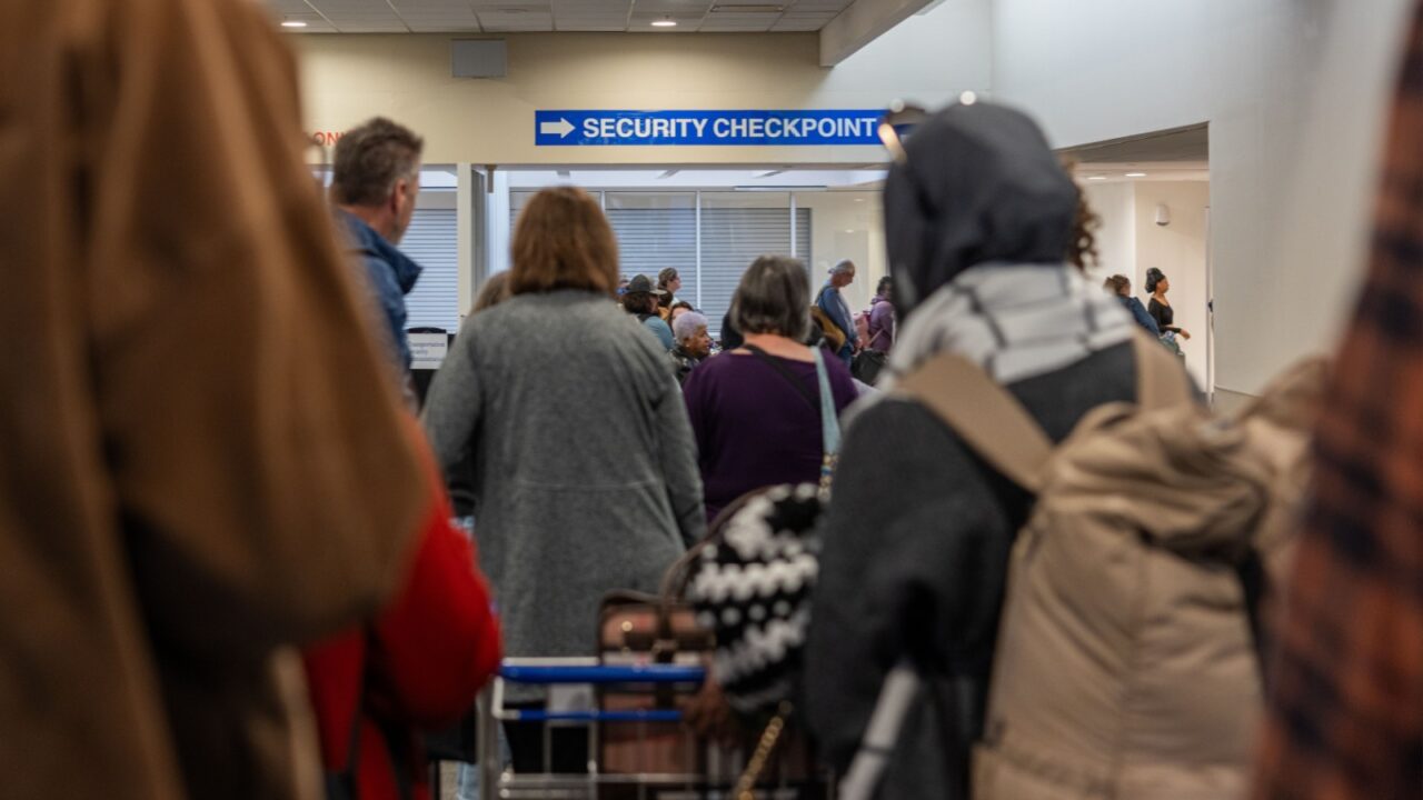 SAVANNAH, GEORGIA, NOVEMBER 9, 2025: Airline passengers wait in line for the security checkpoint at Savannah Hilton Head International Airport