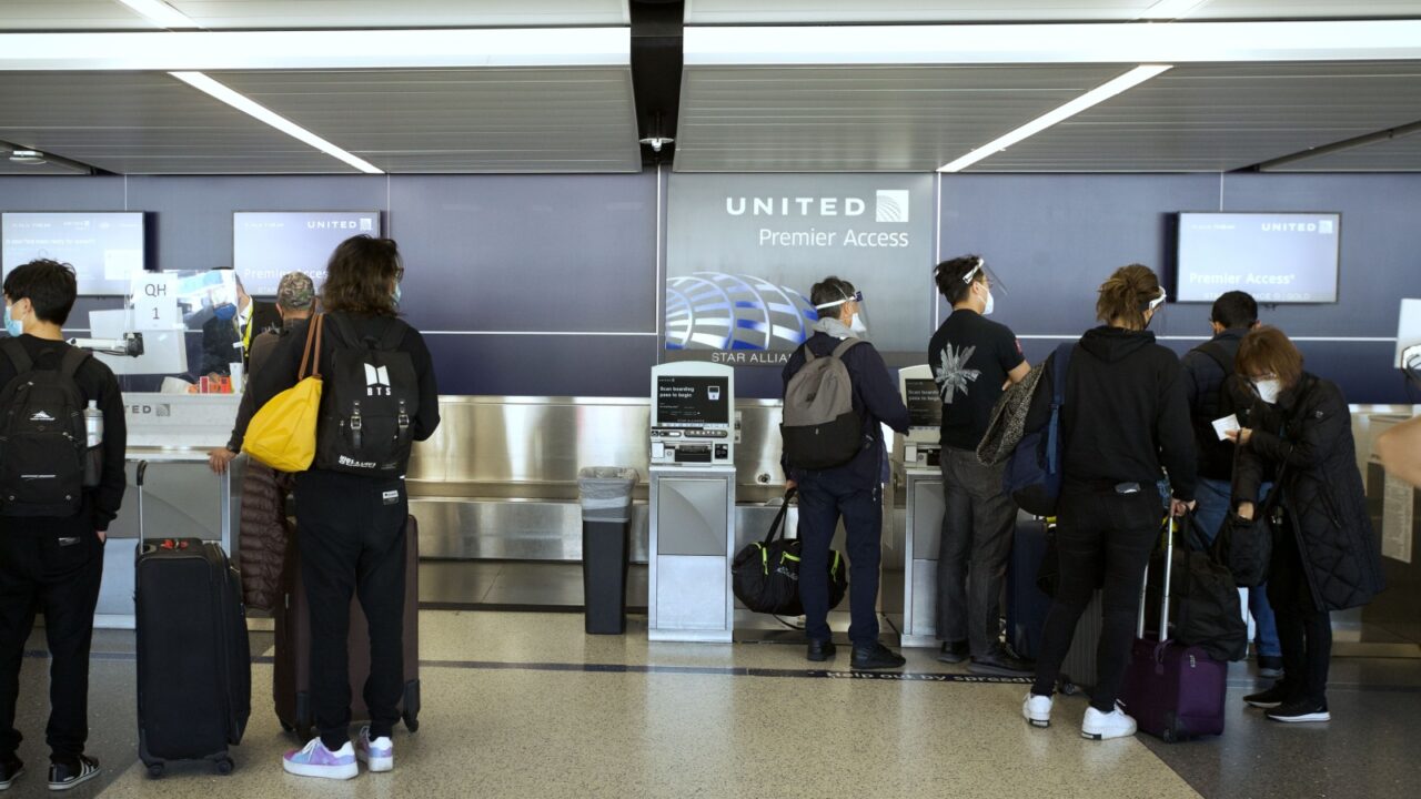 LOS ANGELES, UNITED STATES - Dec 25, 2021: Los Angeles passengers wait at the United Airlines ticket counter