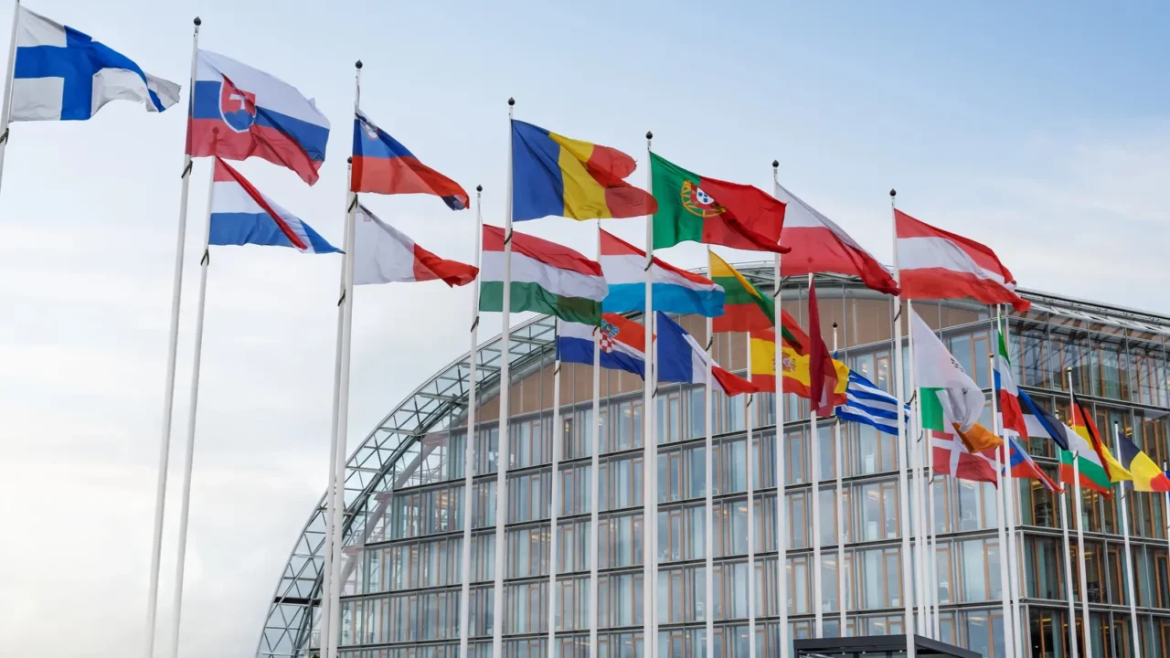 flags in front of the european investment bank at kirchberg