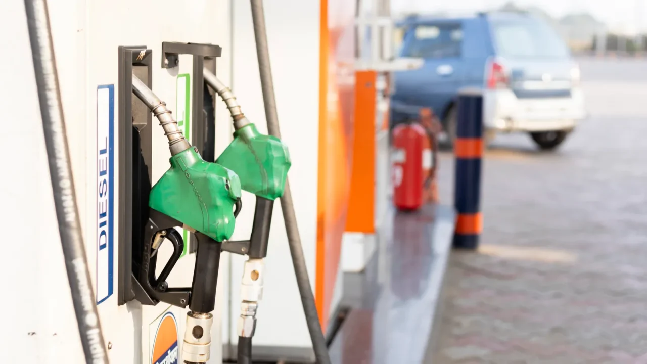 selective focus on fuel pump nozzles of a fuel station